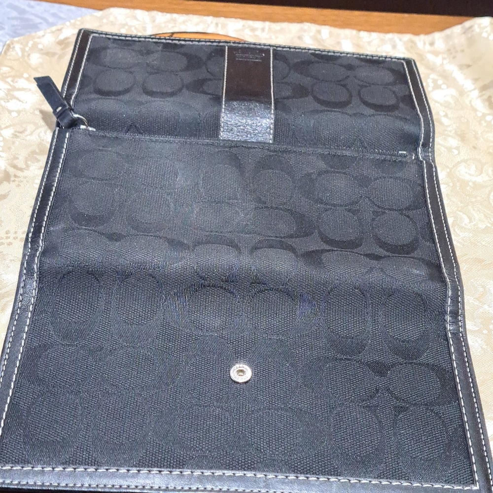 NWOT black trifold Coach wallet. 7 3/4" diameter x 4.5" height x1 " wide closed